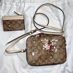 Brown with flowers Coach crossbody with ID card holder.